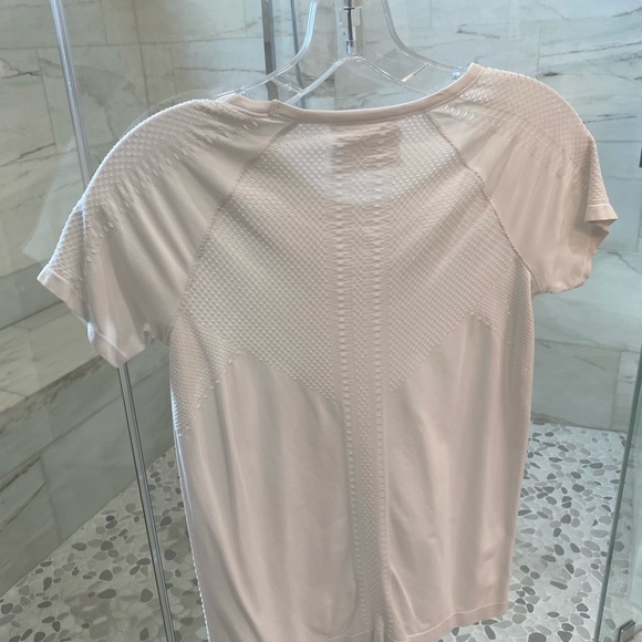 Small, white Athleta Momentum top. Worn once. - Picture 2 of 2